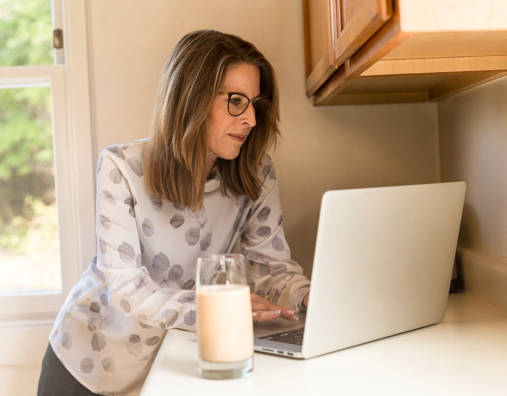 Homeowner checking their digital HELOC application from a laptop at home